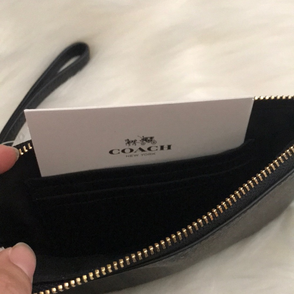 SOLD ON NEXTDOOR Coach wristlet - Picture 3 of 4